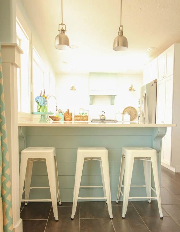 handmade aqua blue planked shiplap kitchen peninsula island in a white coastal kitchen, The Happy Housie on @Bekob