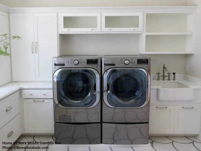 Stainless Steel Front Loading Washer And Dryer In White Laundry Room, Jerry Stubbs Construction And Tique And Company, 2018 Utah Valley Parade Of Homes Featured On Bekob