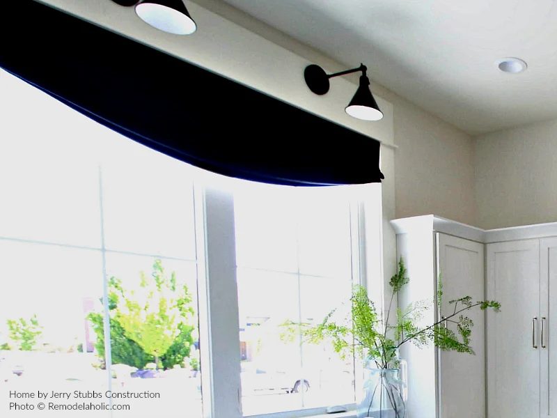 Roman Shade And Black Light Fixtures In White Laundry Room, Jerry Stubbs Construction And Tique And Company, 2018 Utah Valley Parade Of Homes Featured On Bekob