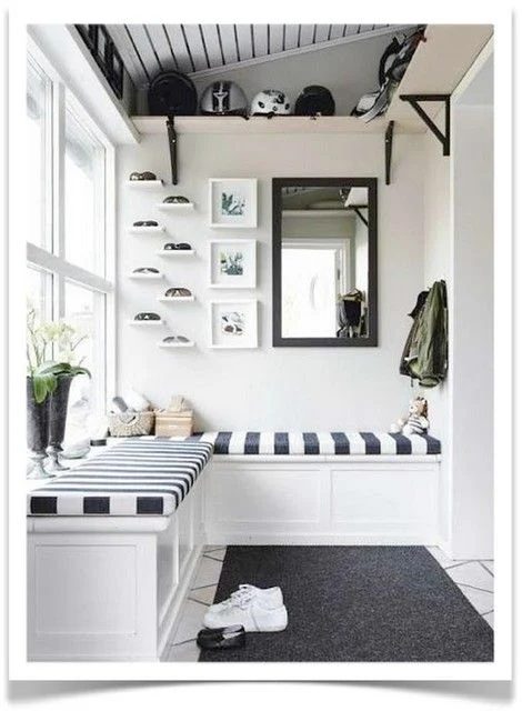 Monochrome Entry Inspiration: This black and white entry mudroom area is well fitted. A bench for sitting and storage, plus the shelves hold helmets and bags. Love the little ledge