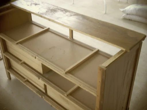 cutting the dresser to make the mudroom bench