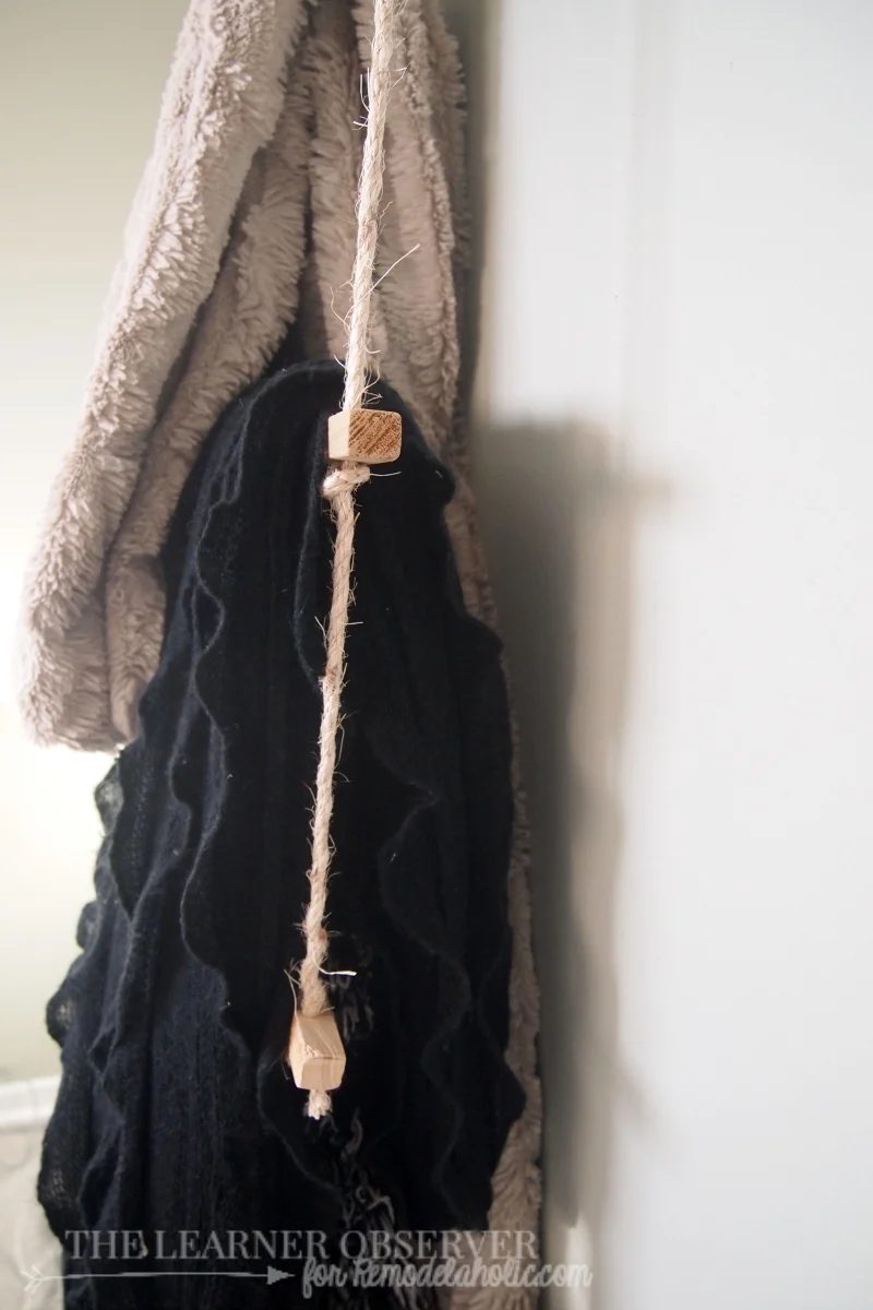 Using just rope and some 1x1 wood you can make a great towel or blanket rack in 15 minutes! Via The Learner Observer for Bekob.com