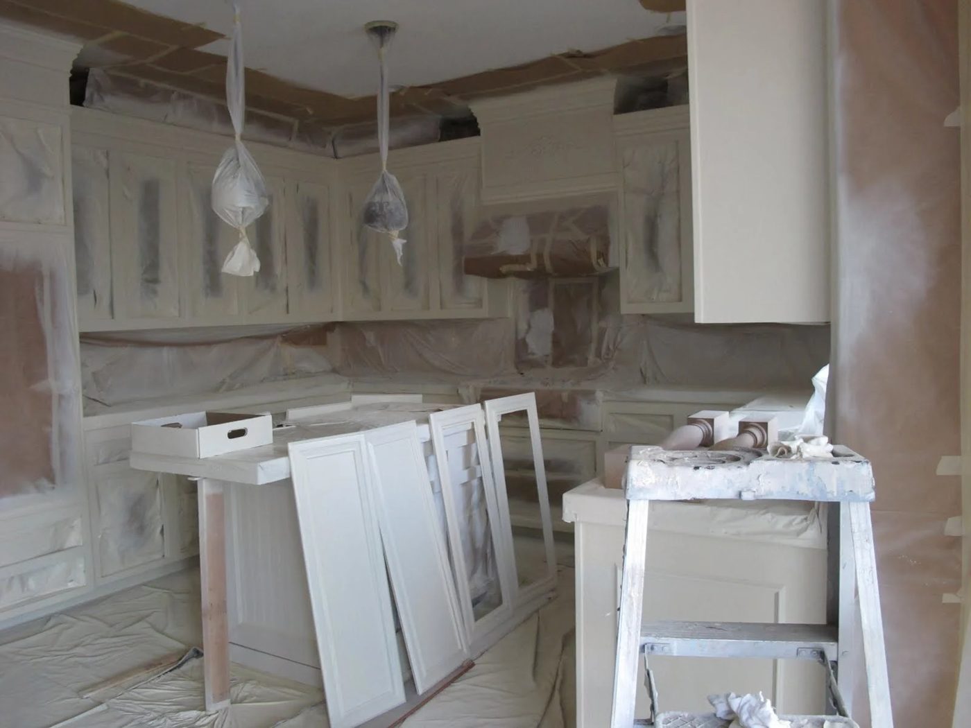 7 Paint kitchen cabinets white, by My Uncommon Slice of Suburbia featured on @Bekob