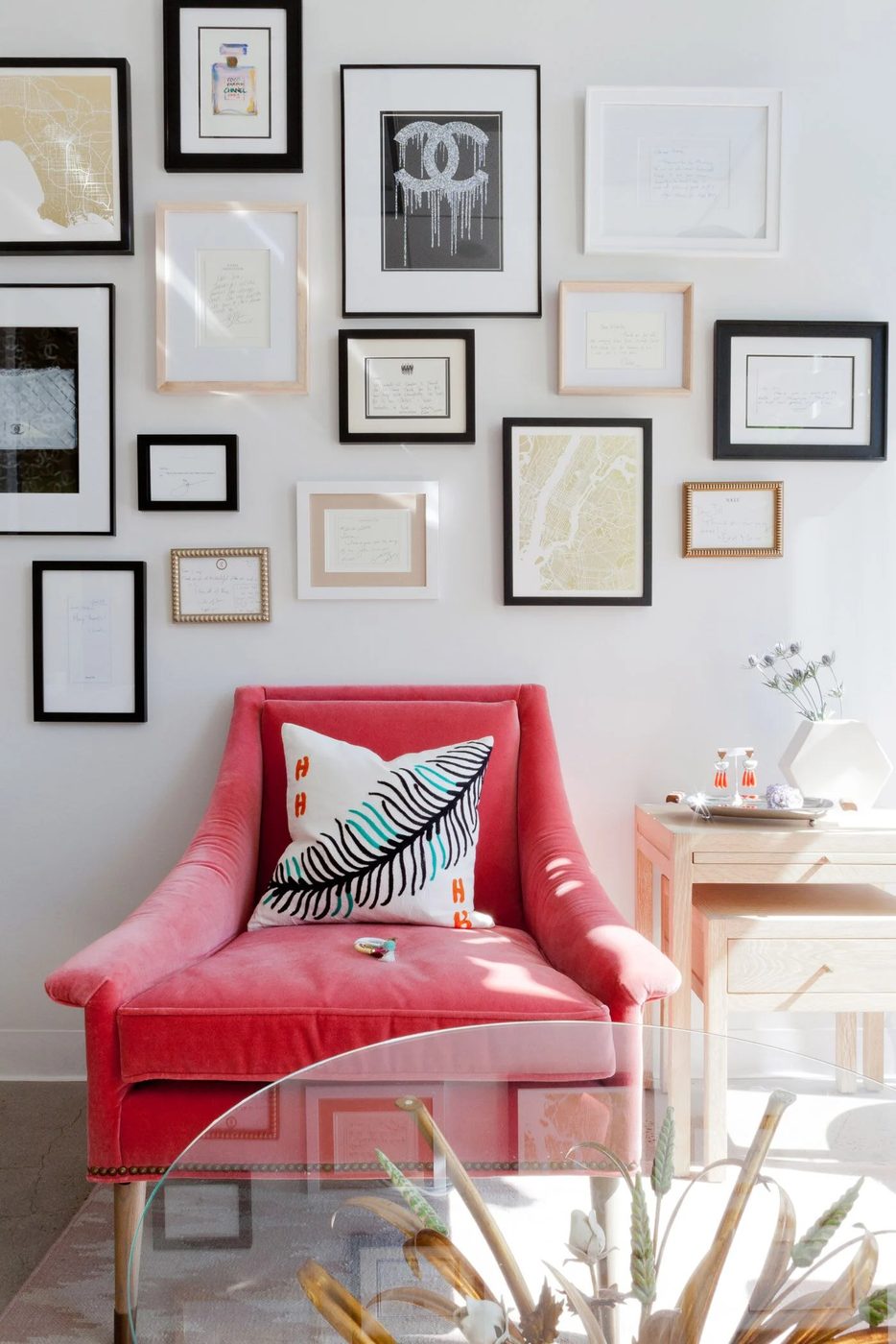 Homepolish Stefan Stein - Anthroplogie chair with gallery wall