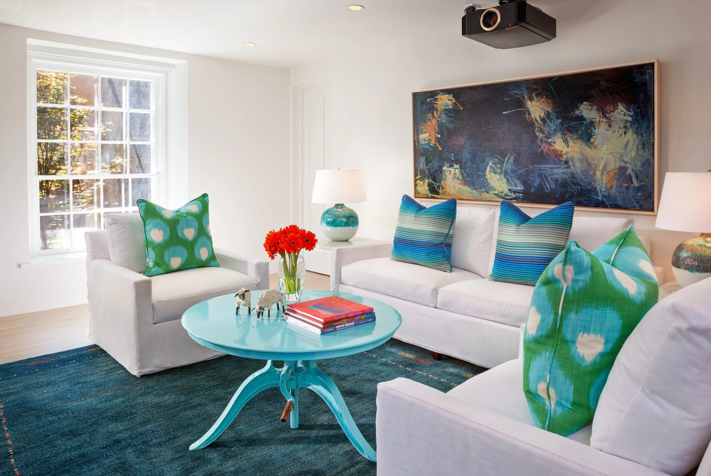 striking open living room -- this room doesn't feel small at all even though it's not enormous! Smart tips! | by Violante & Rochford Interiors, photo credit © Wendy McEahern