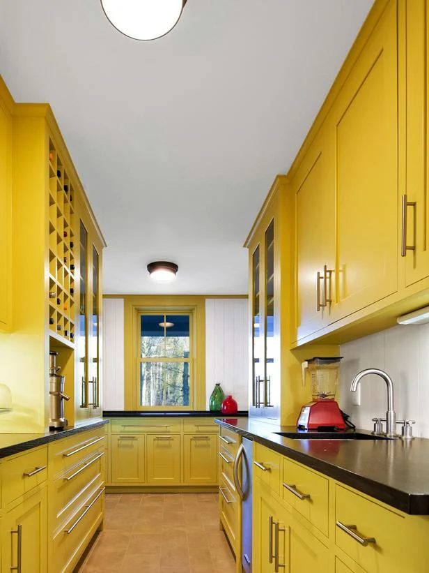 HGTV Remodels energetic yellow kitchen