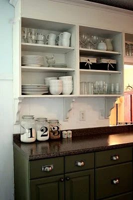 The Virginia House moss green cabinets