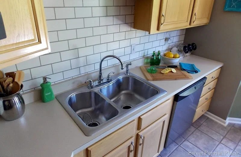 subway tile backsplash painted in the kitchen