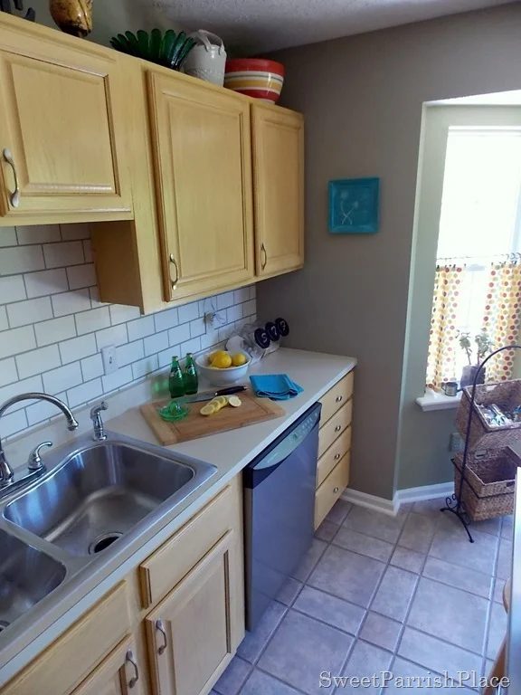 kitchen with faux painted subway tile backsplash