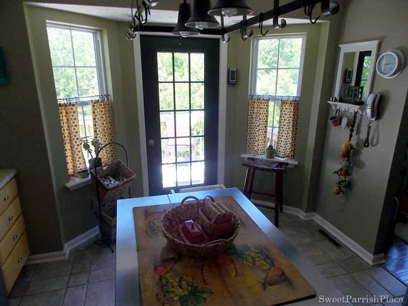 kitchen with painted subway tile backsplash