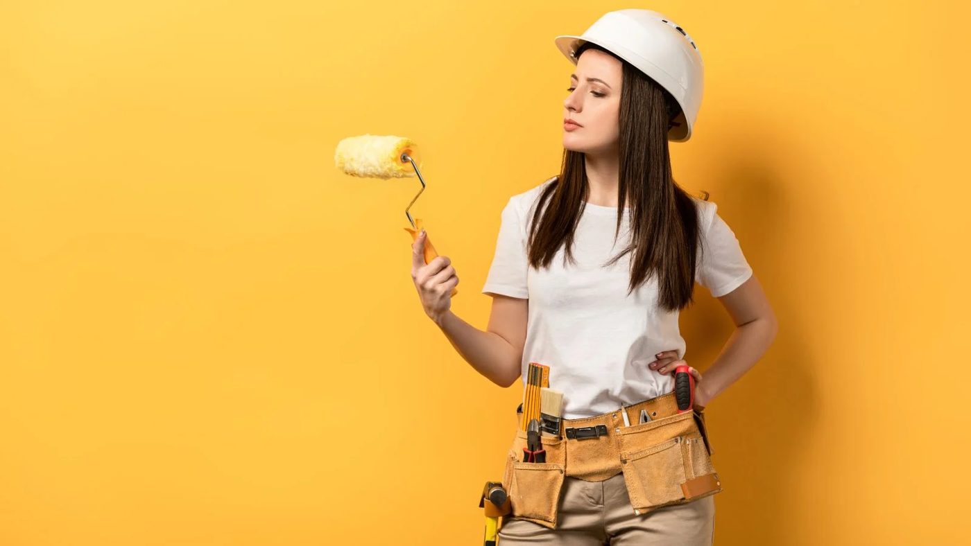 Woman Holding Paint Roller