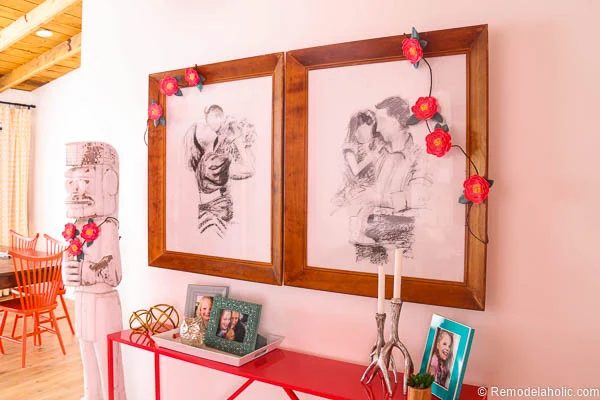 This striking paper flower garland looks strong draped over family portraits. Great for party decor or anywhere you need a little color. Free printable from @Bekob and Canon.