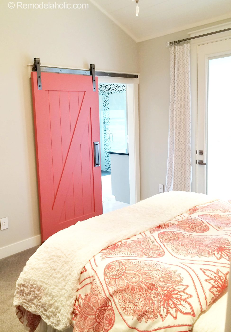 Coral Barn Door to Bathroom in Master Bedroom