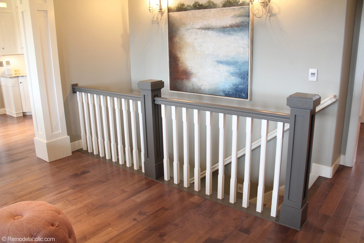 Grey and white hand rail, stairs