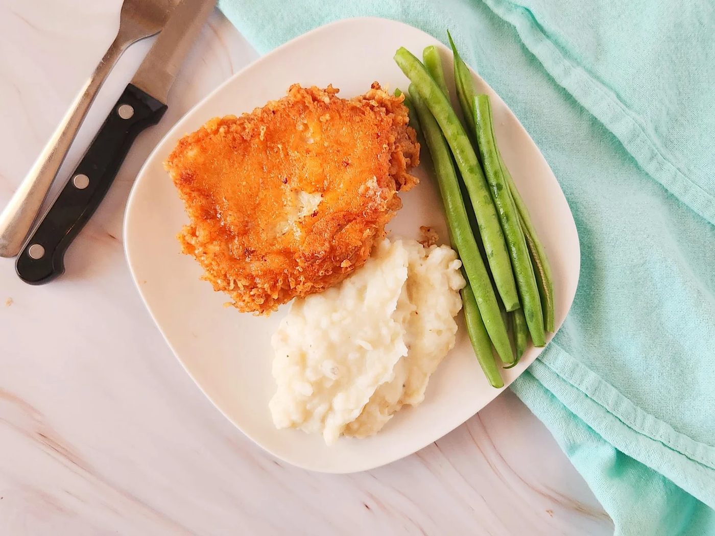 Elevate Your Dinner Game with Parmesan-Crusted Pork Chops: A Culinary Delight
