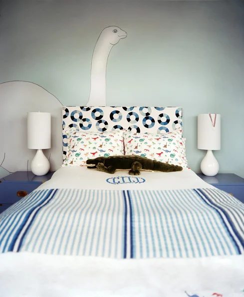 pattern mixing boys room in blue with dinosaur mural, Lonny