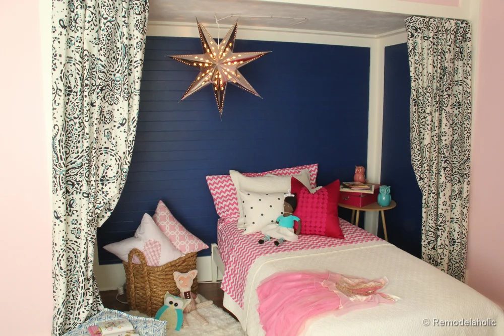 Pink and Navy Girls bedroom with bed nook