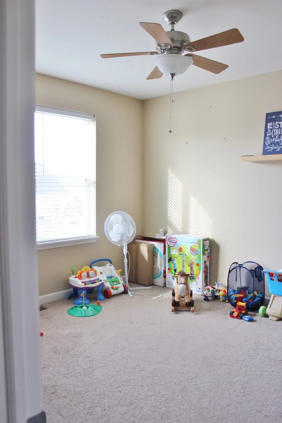Playroom Makeover with Built-In Cabinets Before by Delightfully Noted featured on Bekob