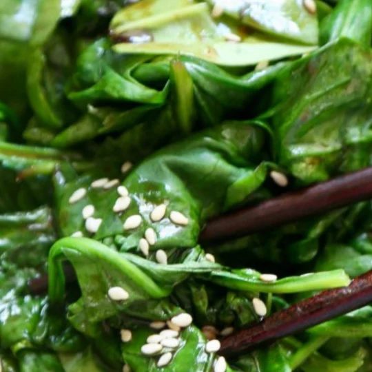 Japanese Spinach Salad With Sesame Seeds And Chopsticks