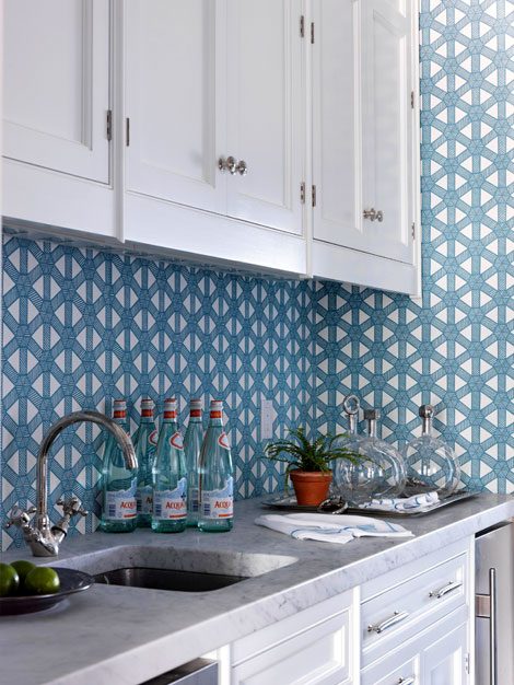 galley kitchen floor plan with blue wallpaper and undermount sink via DecorPad