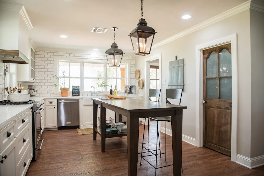 Get This Look: Fixer Upper Worm House Kitchen Image via Magnolia used with permission, warm white kitchen with wood tones and more