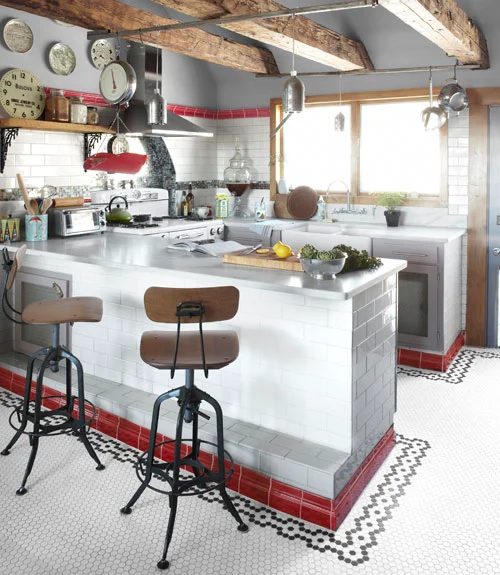 peninsula kitchen layout floor plan with open ceiling beams and tile via Country Living