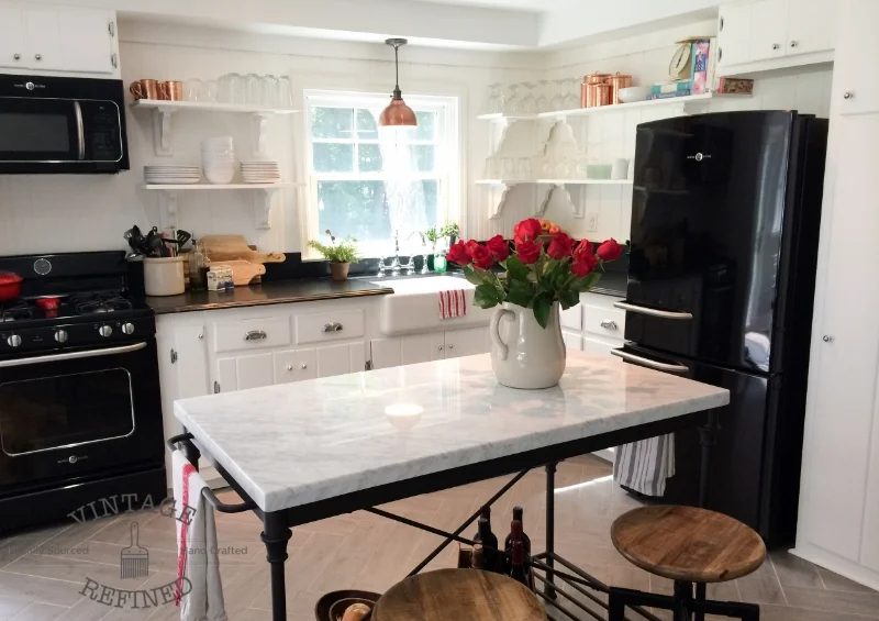 memorable kitchen remodel handmade, white kitchen with black appliances, by Vintage Refined featured on @Bekob