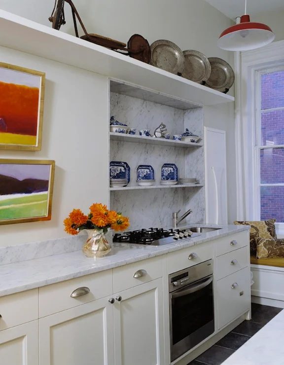 galley kitchen layout with marble countertops via DecorPad