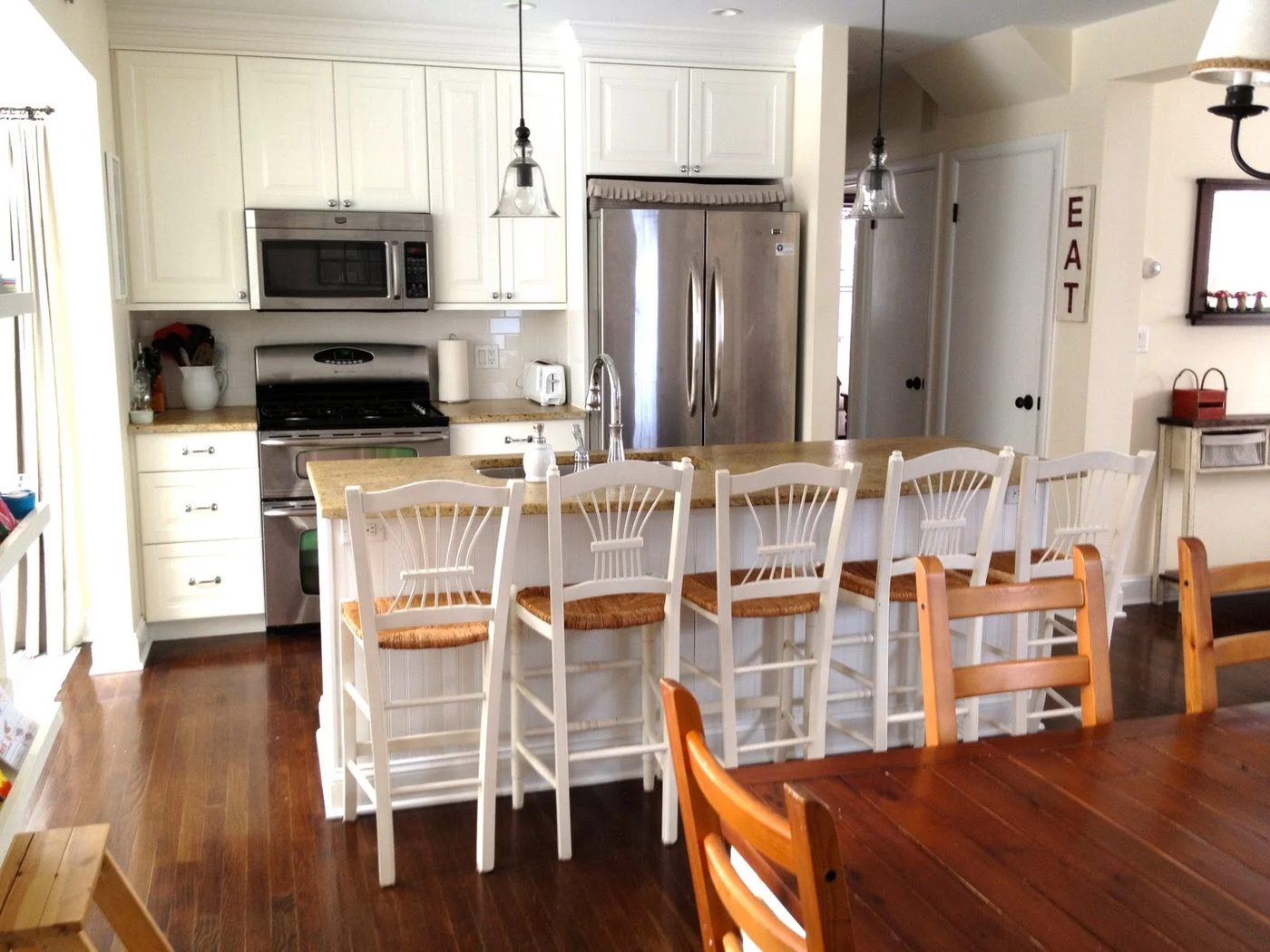 single wall kitchen layout with kitchen sink island via Bekob.com