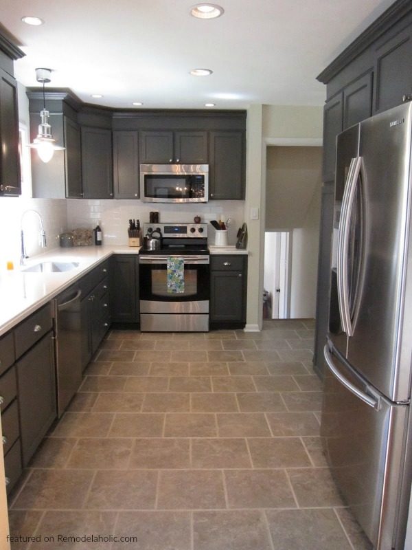 Narrow U-shaped Kitchen Floor Plan Layout | Kitchen Renovation With Charcoal Dark Gray Kitchen Cabinets In Peppercorn With White Countertops And Stainless Steel Appliances, Feature