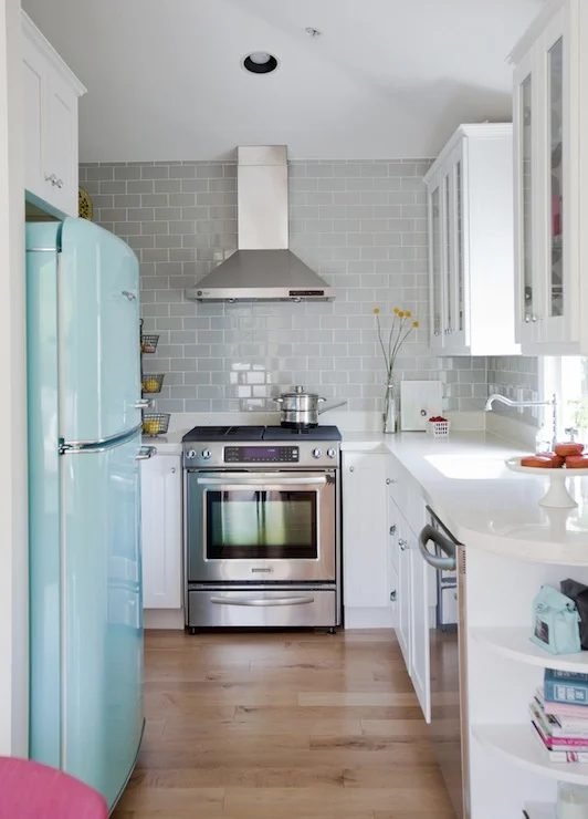 horseshoe U-shaped kitchen layout with gray subway tile via DecorPad