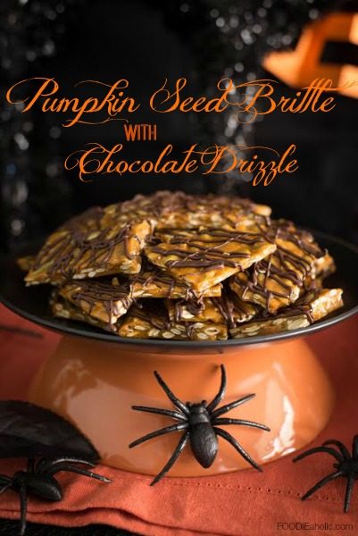 Pumpkin Seed Brittle with Chocolate Drizzle | FOODIEaholic.com #recipe #cooking #candy #sugar #brittle #pumpkin #pumpkinseeds #Halloween #holiday #chocolate