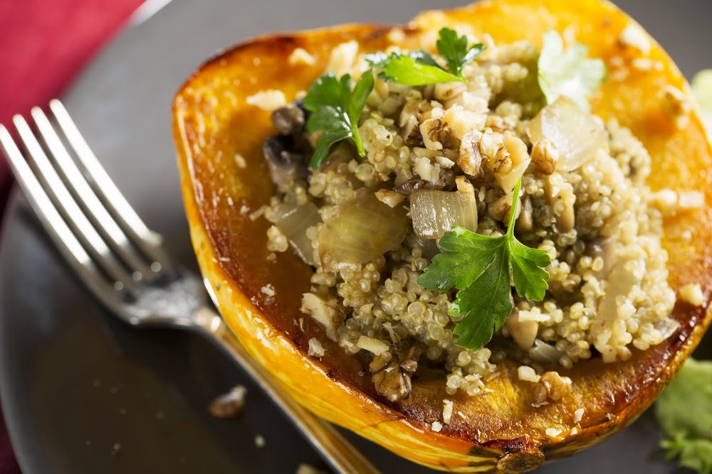 Quinoa and Pumpkin Seed Stuffed Acorn Squash | FOODIEaholic.com #recipe #cooking #Thanksgiving #holiday #healthy #diet #acornsquash #quinoa #pumpkin
