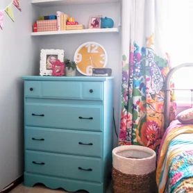Updating a basic dresser with a bright paint job.