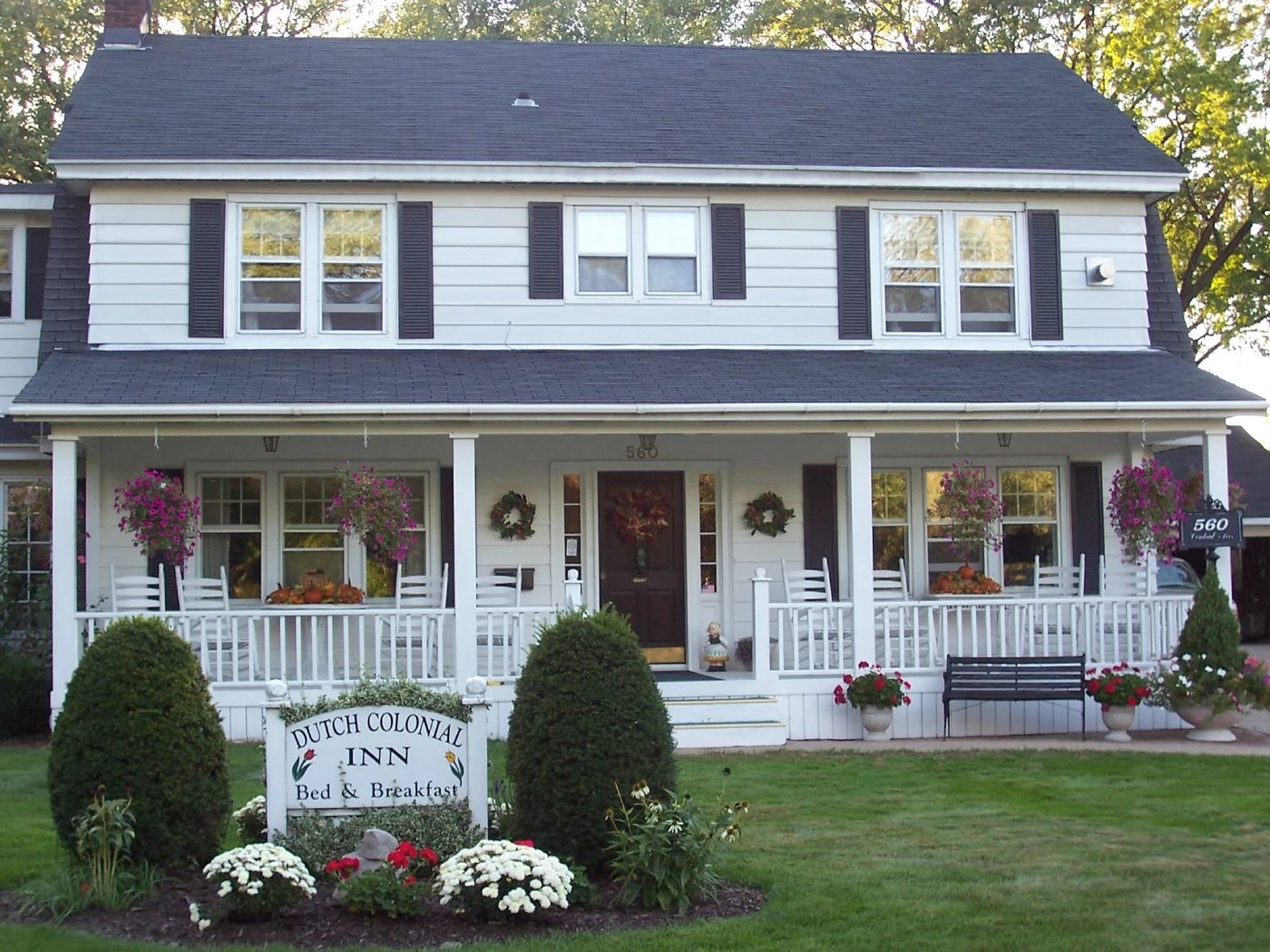 Dutch Colonial Inn | Colonial Porch Curb Appeal options and Inspiration (with columns and railing)