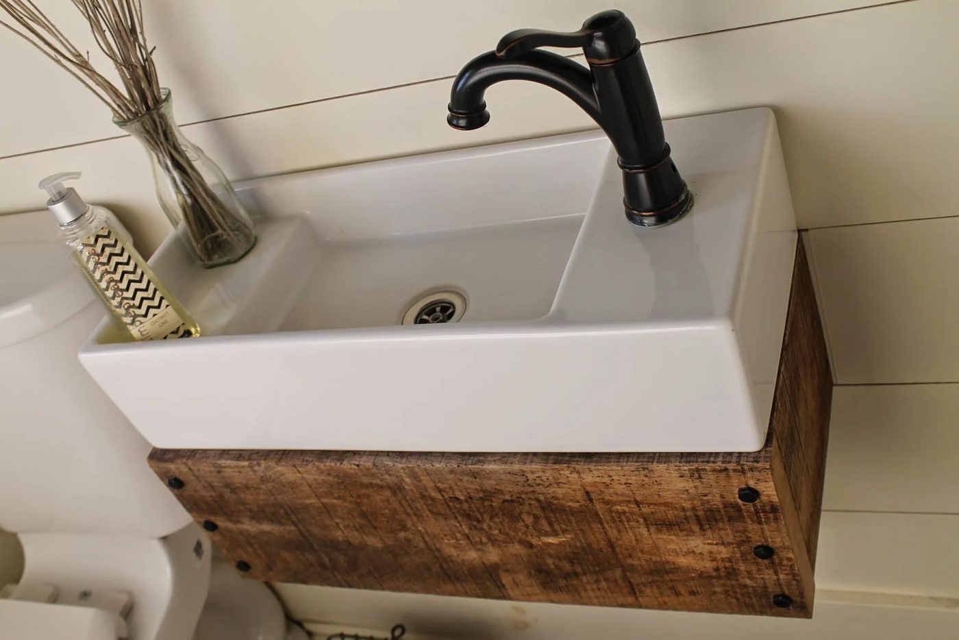 build a wood floating vanity to fit an IKEA sink - Girl Meets Carpenter featured on @Bekob