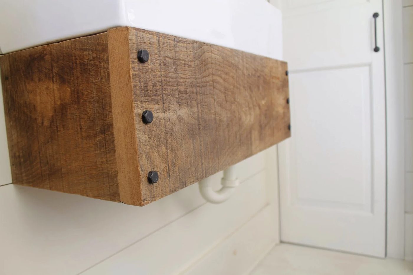 use reclaimed wood to make an straightforward floating bathroom vanity - Girl Meets Carpenter featured on @Bekob