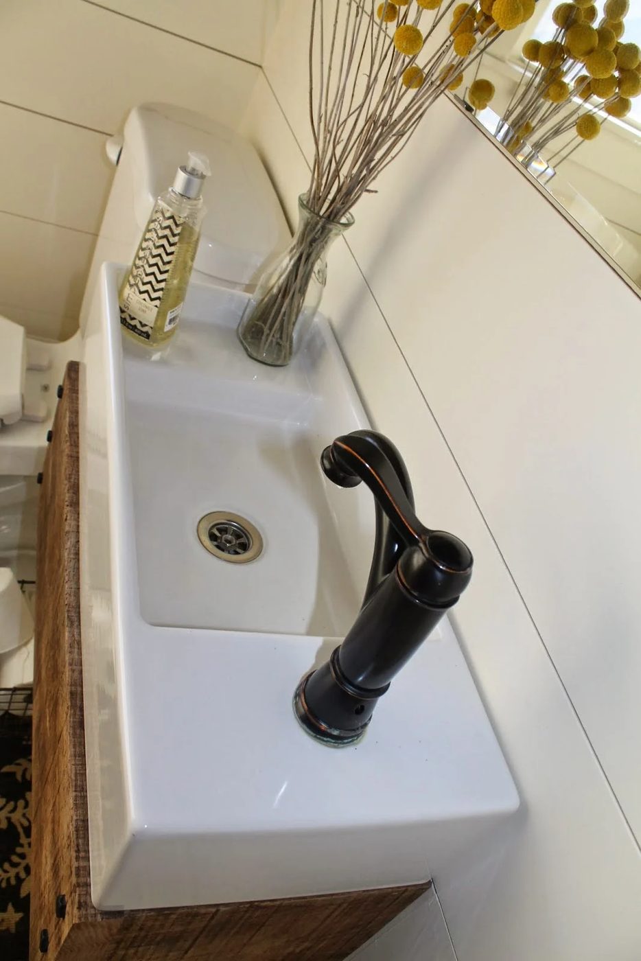 handmade wood floating vanity with farmhouse sink - Girl Meets Carpenter featured on @Bekob