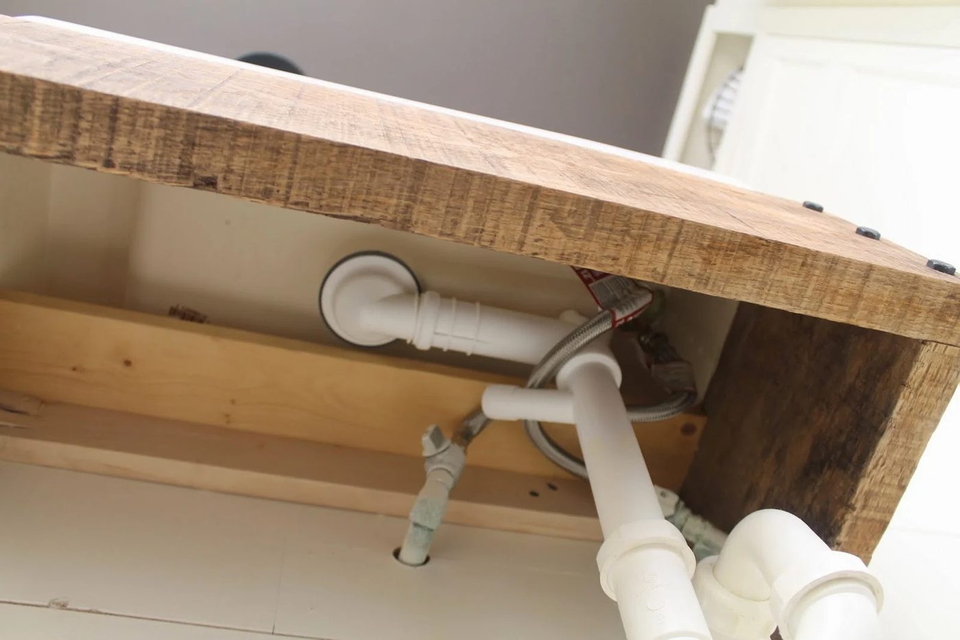 handmade reclaimed wood floating vanity - Girl Meets Carpenter featured on @Bekob