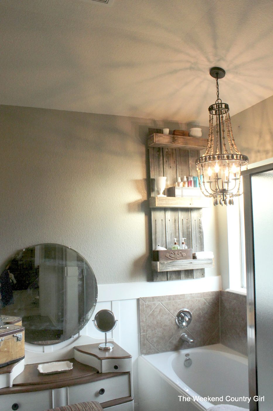 A vivid wooden shelf in a bathroom. From Trash to Terrific: Reclaimed Wood Projects to Handmade