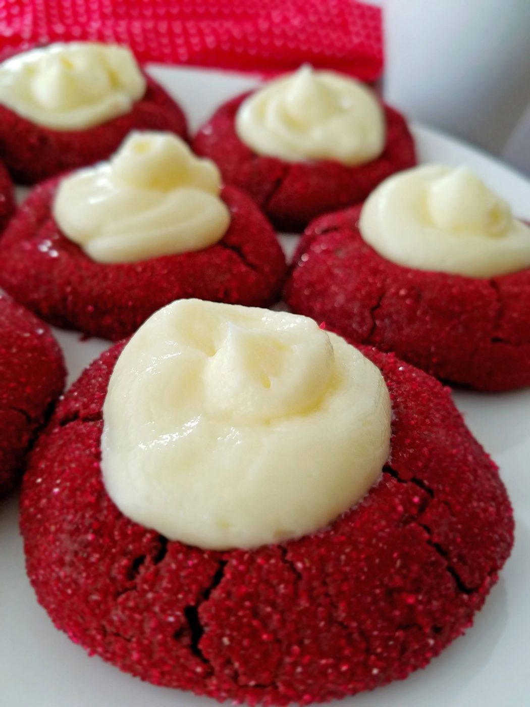 Red Velvet Thumbprint Cookies with Cream Cheese Filling are to die for! well fitted for Christmas, Valentine's Day or a romantic night. Recipe at Bekob.com