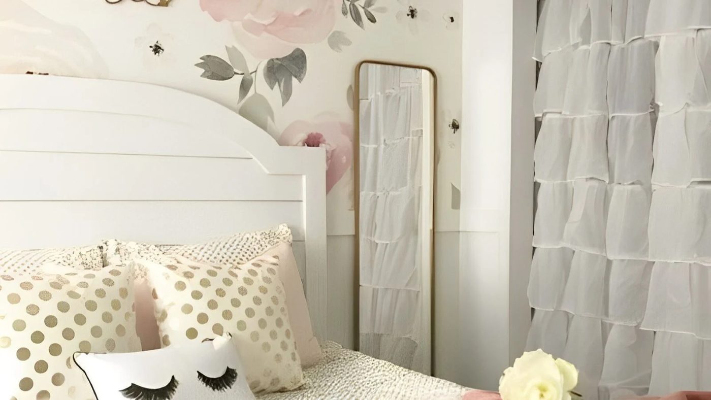 White Bed With FLoral Accent Wall And White Curtained Closet And Blush Accents 450x404 (1)