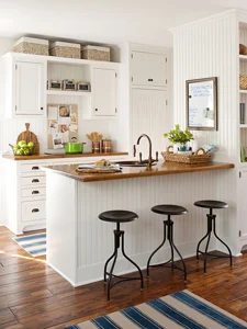warm wood tones in a white kitchen thumb