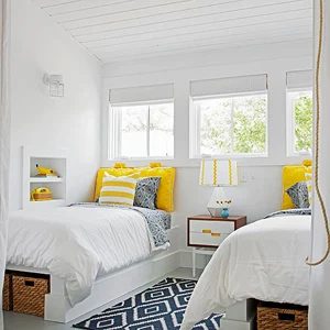 yellow and navy shared bedroom