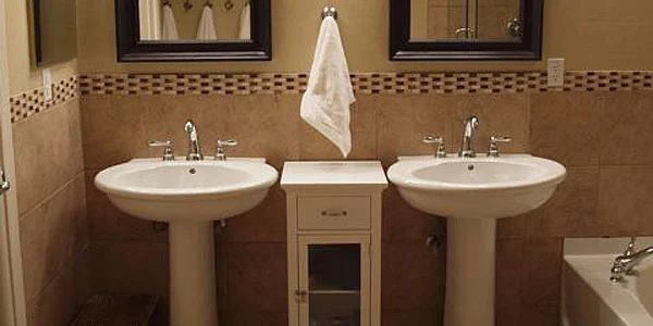 Remodeled Master Bathroom With Tile and Glass Shower