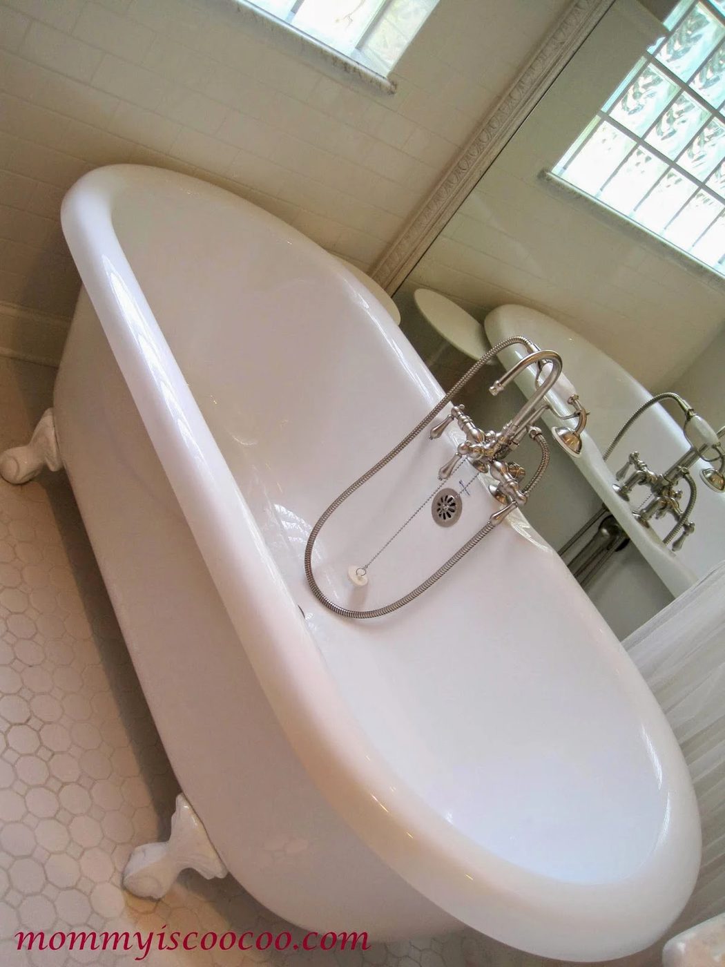 cast iron tub with mirror behind, Mommy is Coocoo on Bekob