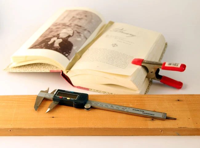 turn old books into a wall shelf