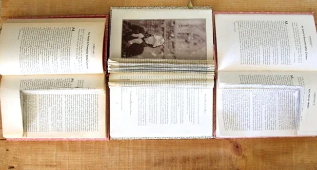 Handmade walkthrough for old books turned into a wall shelf with corbels
