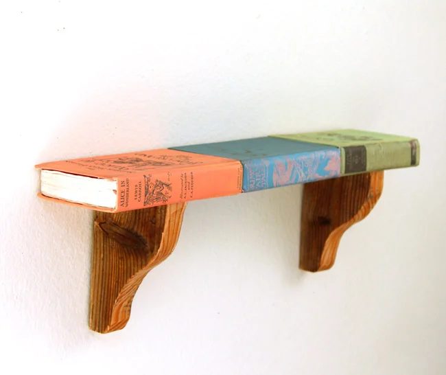 Handmade upcycled book shelf with wood corbels and printable book covers