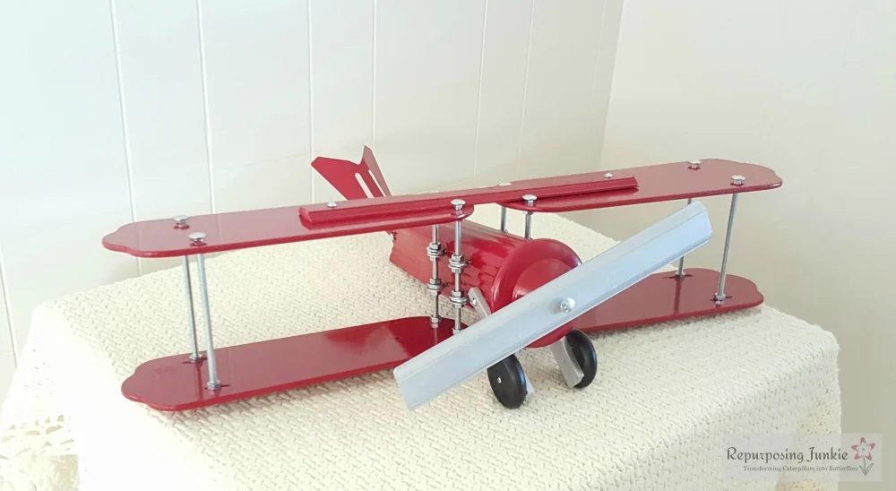 16 Build decorative airplane from repurposed ceiling fan blades, front view 2, by Repurposing Junkie featured on @Bekob